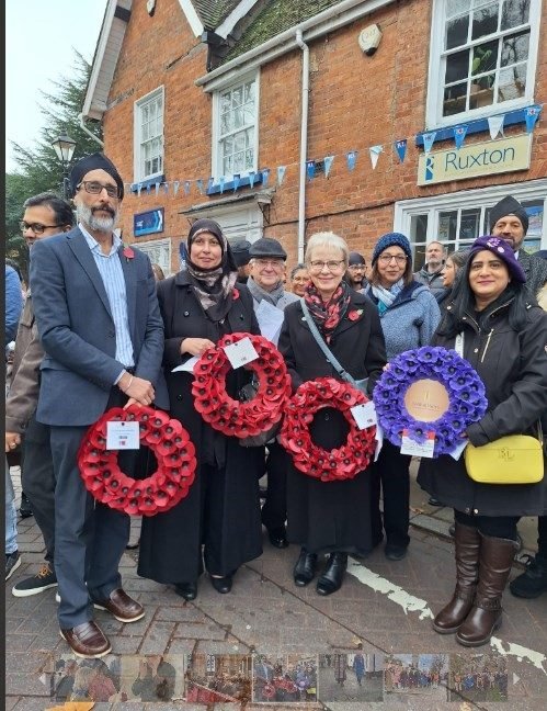 SCMCC representatives with remembrance wreaths